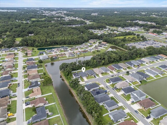910 Blue Tide Ln, Lakeland, FL 33809 - aerial view of property's location featuring a nearby body of water and nearby suburban area