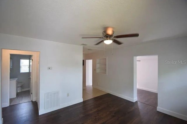 520 Oakland Rd, Auburndale, FL 33823 - spare room featuring a ceiling fan and wood finished floors