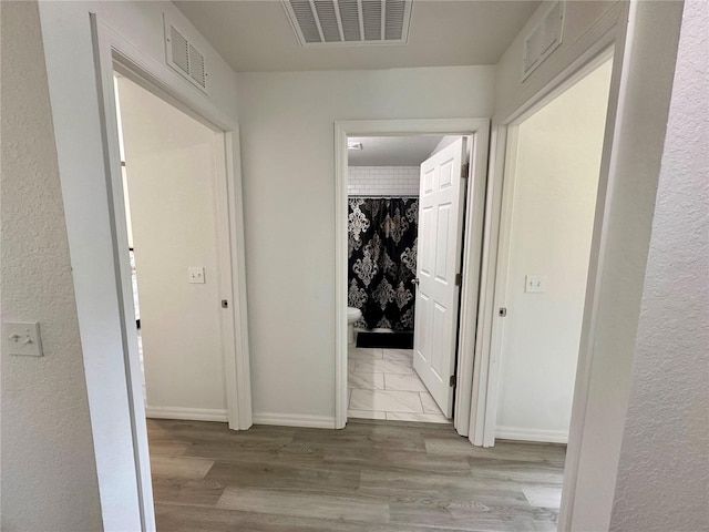 1736 3rd St NE, Winter Haven, FL 33881 - hallway with wood finished floors