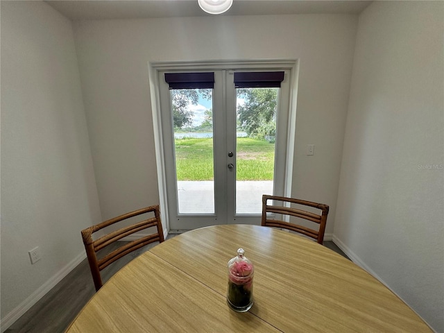 1736 3rd St NE, Winter Haven, FL 33881 - dining room featuring french doors and wood finished floors