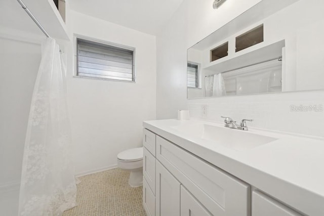 1700 6th St NW Unit A38, Winter Haven, FL 33881 - bathroom featuring vanity, tile patterned floors, and a shower with shower curtain