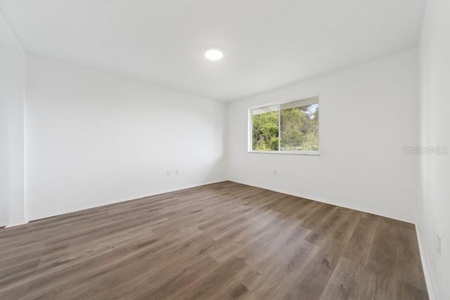 1700 6th St NW Unit A38, Winter Haven, FL 33881 - unfurnished room with wood finished floors and baseboards