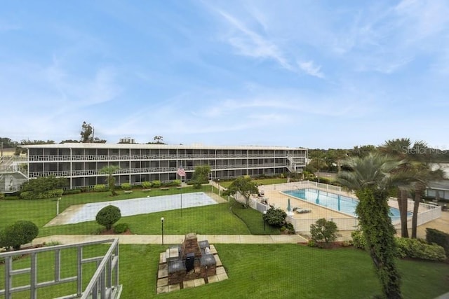 1700 6th St NW Unit A38, Winter Haven, FL 33881 - surrounding community featuring a lawn and a swimming pool