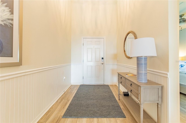2090 Lelani Cir, Davenport, FL 33897 - hallway with wainscoting and light wood-style floors