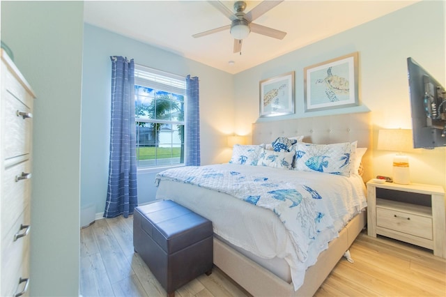 2090 Lelani Cir, Davenport, FL 33897 - bedroom with light wood finished floors and ceiling fan