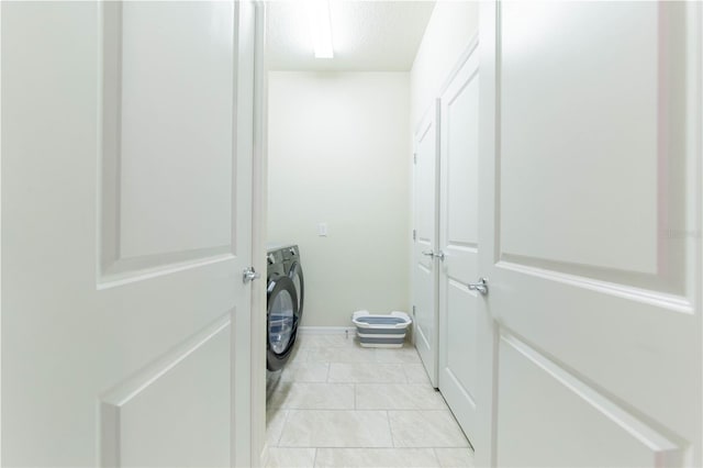2090 Lelani Cir, Davenport, FL 33897 - laundry area featuring washing machine and clothes dryer and baseboards
