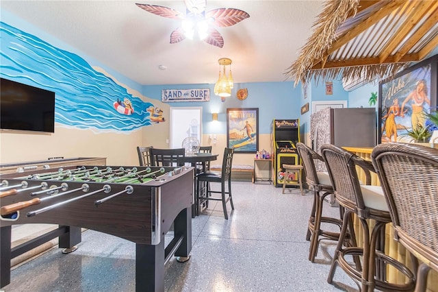 2090 Lelani Cir, Davenport, FL 33897 - recreation room featuring speckle patterned floor and ceiling fan