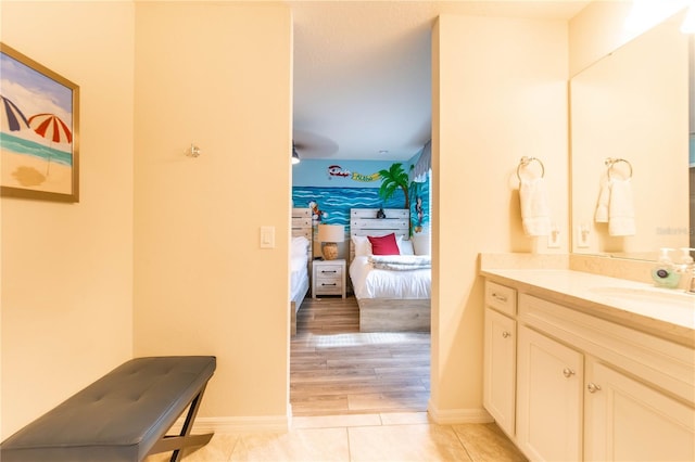 2090 Lelani Cir, Davenport, FL 33897 - bathroom with vanity, ensuite bathroom, and tile patterned flooring