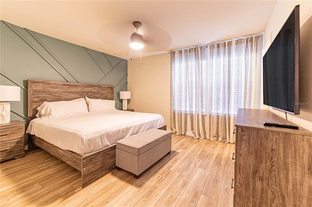 2090 Lelani Cir, Davenport, FL 33897 - bedroom with light wood-type flooring and a ceiling fan