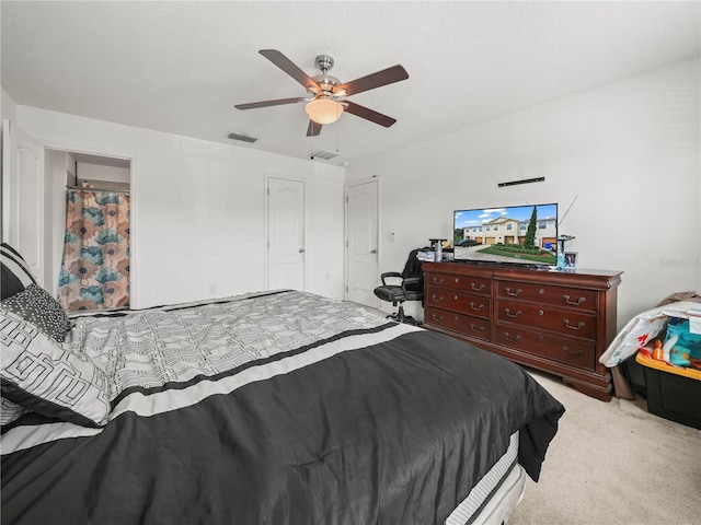3747 Woodbury Hill Loop, Lakeland, FL 33810 - carpeted bedroom with a ceiling fan