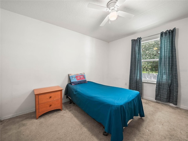 3747 Woodbury Hill Loop, Lakeland, FL 33810 - bedroom featuring light carpet and a ceiling fan