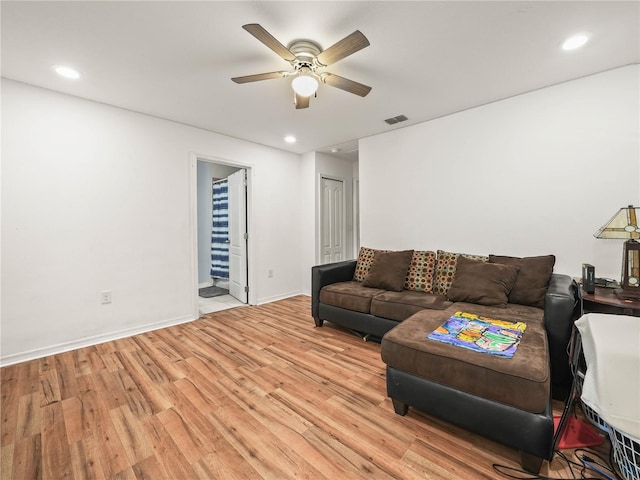 3747 Woodbury Hill Loop, Lakeland, FL 33810 - living room with light wood-style floors, a ceiling fan, and recessed lighting