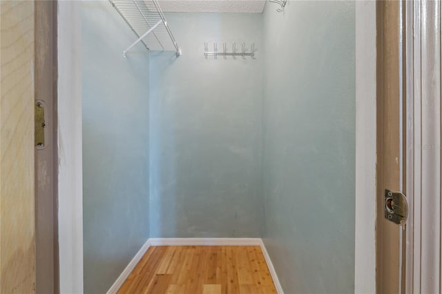 3408 Cove Ct W, Winter Haven, FL 33880 - spacious closet with wood finished floors
