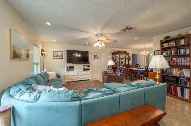 305 Hernando Rd, Winter Haven, FL 33884 - living area with recessed lighting, a chandelier, ceiling fan, and a textured ceiling