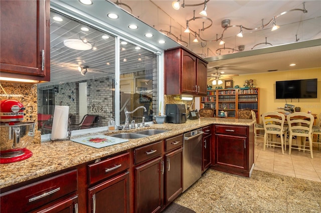305 Hernando Rd, Winter Haven, FL 33884 - kitchen featuring reddish brown cabinets, dishwasher, ceiling fan, and recessed lighting