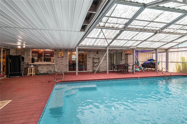 305 Hernando Rd, Winter Haven, FL 33884 - indoor pool featuring a wooden deck and a lanai