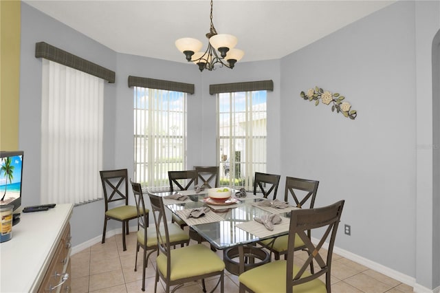 142 Plumoso Loop, Davenport, FL 33897 - dining room with a chandelier and light tile patterned flooring