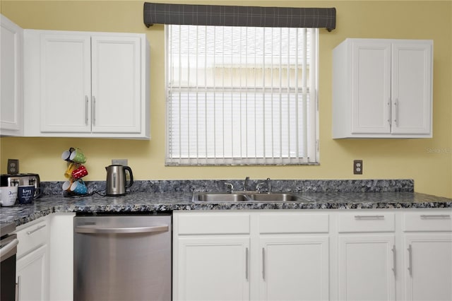 142 Plumoso Loop, Davenport, FL 33897 - kitchen featuring dishwasher and white cabinets