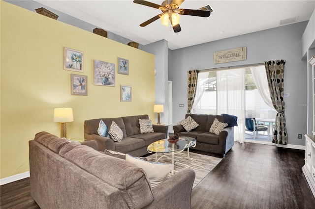 142 Plumoso Loop, Davenport, FL 33897 - living room with a ceiling fan and dark wood-style flooring