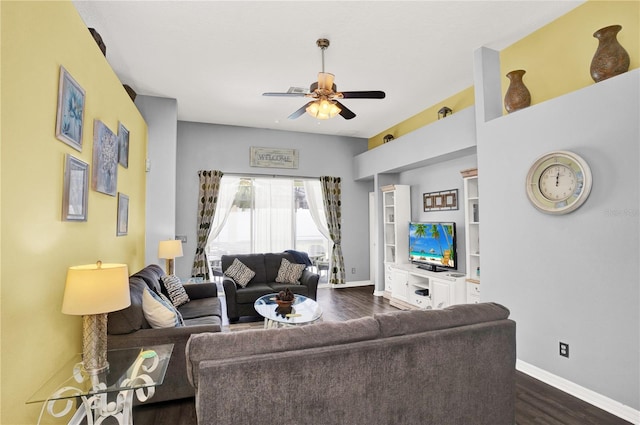142 Plumoso Loop, Davenport, FL 33897 - living room featuring dark wood-type flooring and a ceiling fan