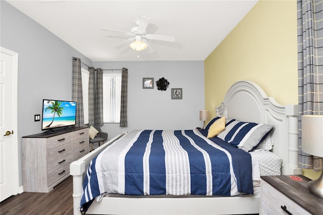 142 Plumoso Loop, Davenport, FL 33897 - bedroom featuring dark wood finished floors and a ceiling fan