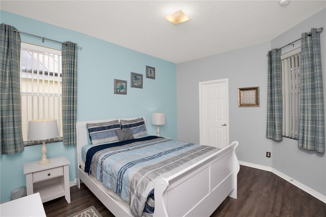 142 Plumoso Loop, Davenport, FL 33897 - bedroom with wood finished floors and baseboards
