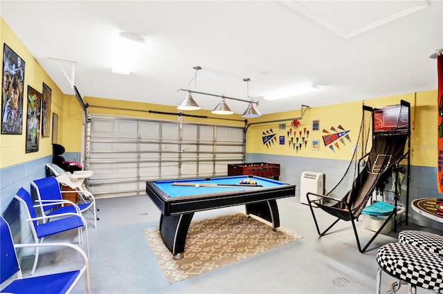 142 Plumoso Loop, Davenport, FL 33897 - game room with finished concrete flooring, a garage, and pool table