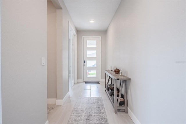 1504 Aspen Ave, Davenport, FL 33837 - entryway featuring baseboards and light tile patterned floors