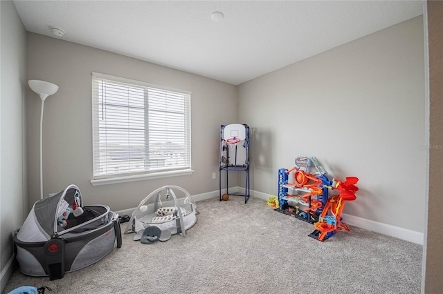 1504 Aspen Ave, Davenport, FL 33837 - playroom with carpet floors and baseboards