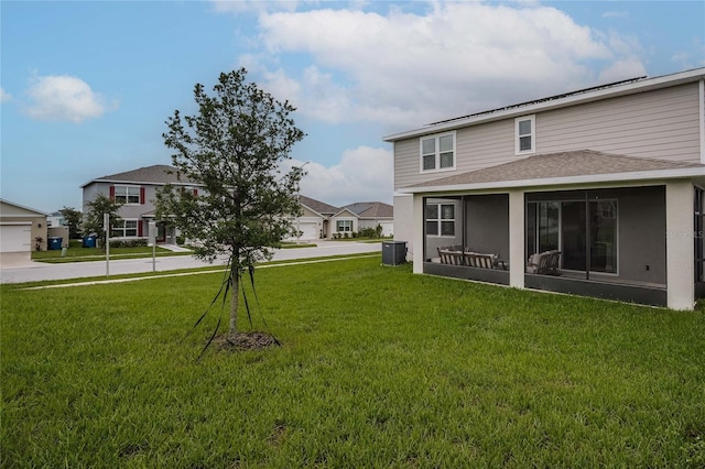 1504 Aspen Ave, Davenport, FL 33837 - view of grassy yard with a sunroom