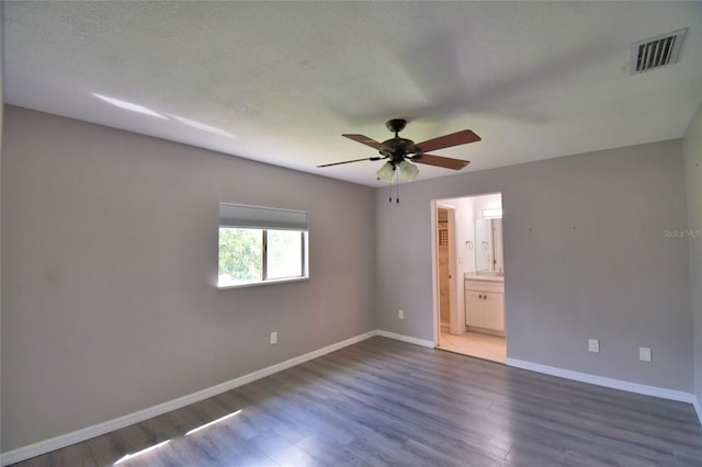 2123 Ramsdale Dr SE, Palm Bay, FL 32909 - spare room featuring wood finished floors and ceiling fan