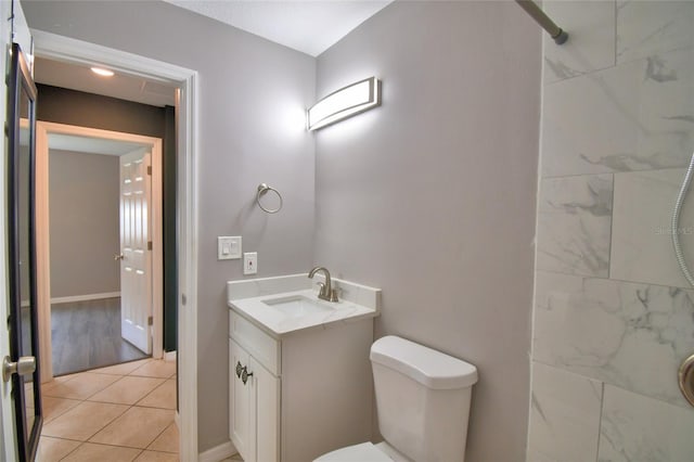 2123 Ramsdale Dr SE, Palm Bay, FL 32909 - bathroom with vanity, tiled shower, and tile patterned flooring