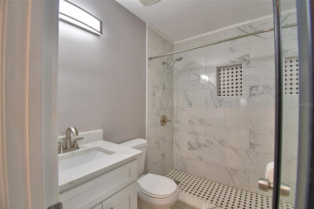 2123 Ramsdale Dr SE, Palm Bay, FL 32909 - bathroom featuring a marble finish shower, vanity, and a textured ceiling