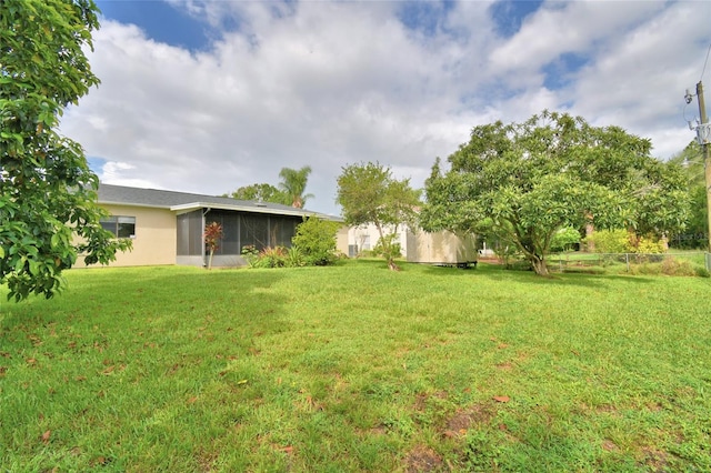 2123 Ramsdale Dr SE, Palm Bay, FL 32909 - view of yard featuring a sunroom