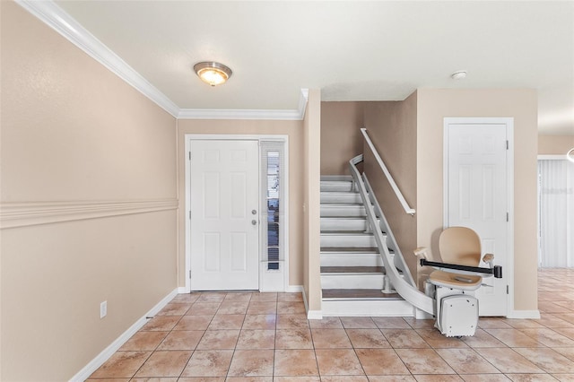 222 Carpenters Way Unit 73, Lakeland, FL 33805 - entrance foyer with stairway, light tile patterned floors, and ornamental molding