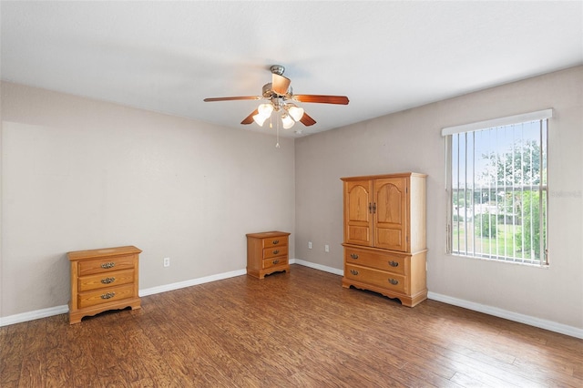 222 Carpenters Way Unit 73, Lakeland, FL 33805 - bedroom with wood finished floors and a ceiling fan