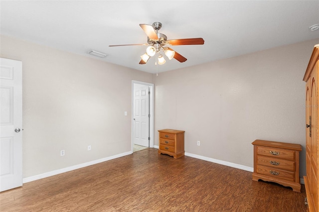 222 Carpenters Way Unit 73, Lakeland, FL 33805 - unfurnished bedroom featuring wood finished floors and a ceiling fan