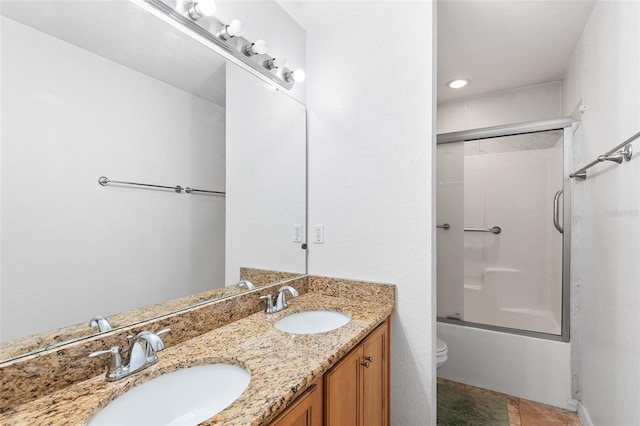 222 Carpenters Way Unit 73, Lakeland, FL 33805 - full bathroom featuring double vanity and combined bath / shower with glass door