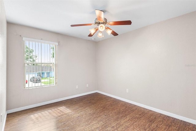 222 Carpenters Way Unit 73, Lakeland, FL 33805 - unfurnished room with wood finished floors and ceiling fan