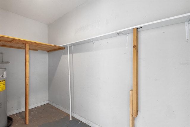 222 Carpenters Way Unit 73, Lakeland, FL 33805 - walk in closet featuring electric water heater