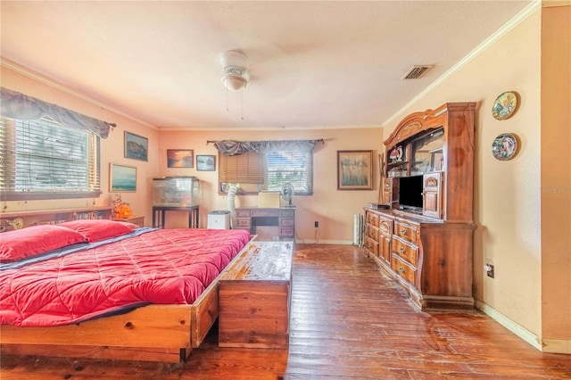 4430 1st St NW, Lakeland, FL 33810 - bedroom featuring ornamental molding and wood-type flooring
