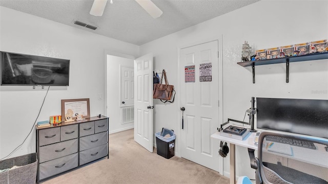 815 Everett St, Lake Alfred, FL 33850 - home office featuring light colored carpet, a textured ceiling, and ceiling fan