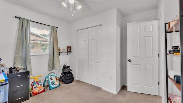 815 Everett St, Lake Alfred, FL 33850 - carpeted bedroom with a closet and a textured ceiling