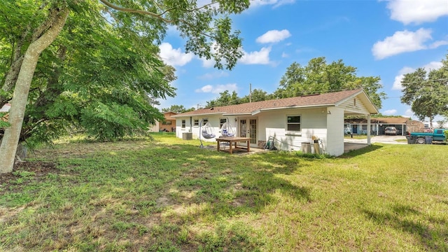 815 Everett St, Lake Alfred, FL 33850 - back of property with a lawn