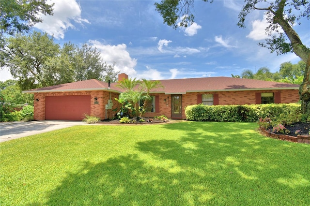 2814 Grapefruit Dr, Auburndale, FL 33823 - ranch-style home with an attached garage, driveway, a front lawn, and brick siding