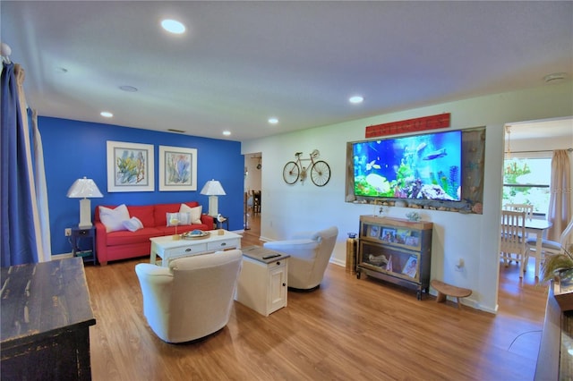 2814 Grapefruit Dr, Auburndale, FL 33823 - living area with light wood finished floors and recessed lighting
