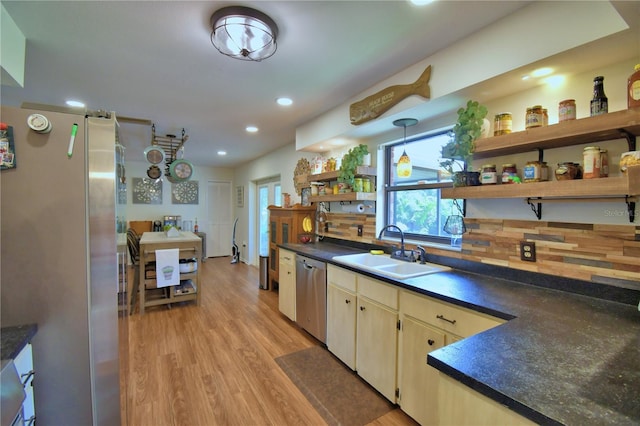2814 Grapefruit Dr, Auburndale, FL 33823 - kitchen featuring appliances with stainless steel finishes, open shelves, recessed lighting, dark countertops, and light wood-style flooring