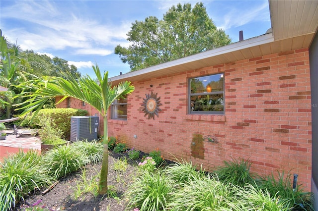 2814 Grapefruit Dr, Auburndale, FL 33823 - view of property exterior featuring brick siding