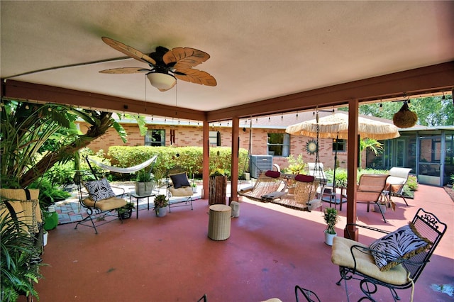 2814 Grapefruit Dr, Auburndale, FL 33823 - view of patio featuring a sunroom and ceiling fan