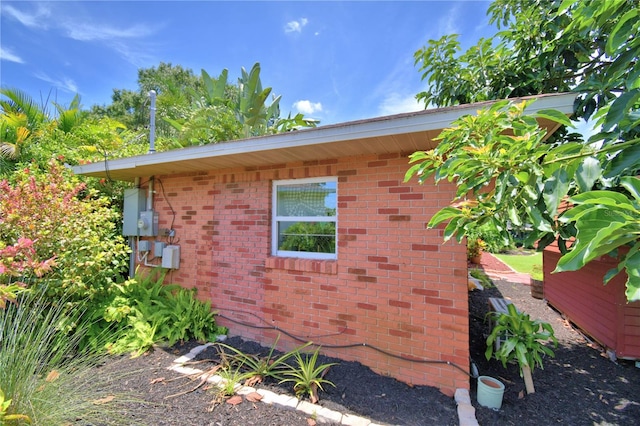 2814 Grapefruit Dr, Auburndale, FL 33823 - view of side of home with brick siding